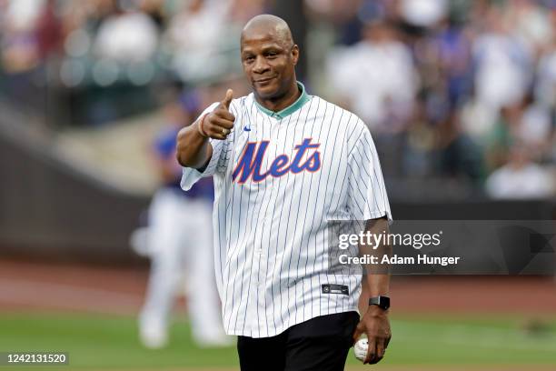 Former New York Mets Darryl Strawberry gestures before throwing out a ceremonial first pitch at Citi Field on July 26, 2022 in New York City.