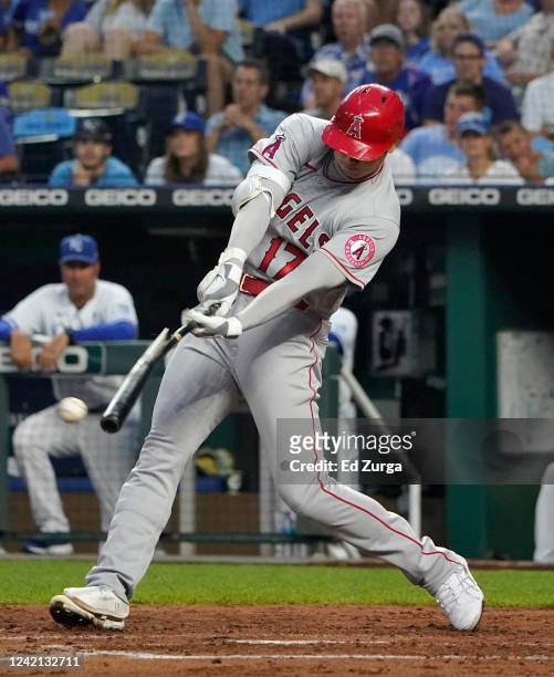 Shohei Ohtani of the Los Angeles Angels breaks his bat as he hits a foul ball in the fifth inning against the Kansas City Royals at Kauffman Stadium...