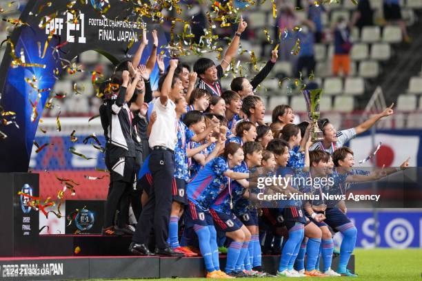 Team Japan pose for photos during the awarding ceremony for women's team of the 2022 EAFF East Asian Football Federation E-1 Football Championship at...