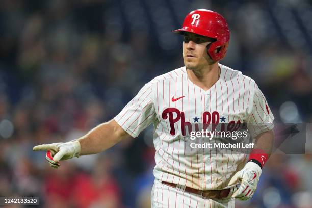 Realmuto of the Philadelphia Phillies reacts after hitting a two run home run in the bottom of the ninth inning against the Atlanta Braves at...