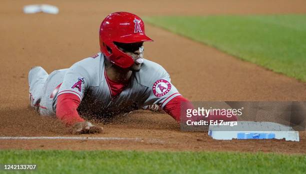 Magneuris Sierra of the Los Angeles Angels slides into third for a stolen base in the seventh inning against the Kansas City Royals at Kauffman...