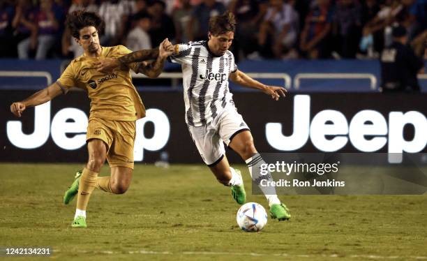 Luca Pellegrini of Juventus controls the ball against FC Barcelona in the second half of a 2022 International Friendly match at the Cotton Bowl on...