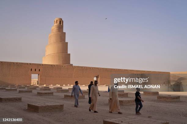 The spiral Malwiya minaret, a mid-ninth century treasured Iraqi national monument, stands at the site of the Great Mosque of Samarra, on July 26 in...