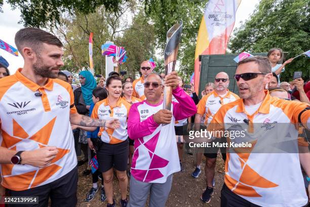 Mohammed Khan takes part in The Queen's Baton Relay as it reaches Birmingham as part of the Birmingham 2022 Queens Baton Relay on July 27, 2022 in...