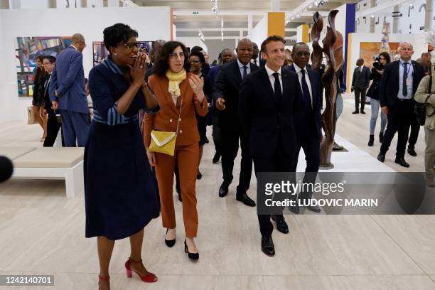 France's President Emmanuel Macron , French Culture Minister Rima Abdul-Malak and Beninese President Patrice Talon visit the "Contemporary Art of...