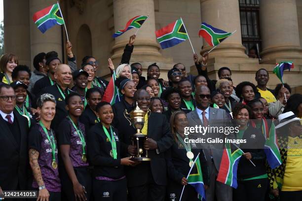 President Cyril Ramaphosa and Banyana Banyana captain Refiloe Jane, coach Desiree Ellis and Minister Nathi Mthethwa holding the 2022 Women's Africa...