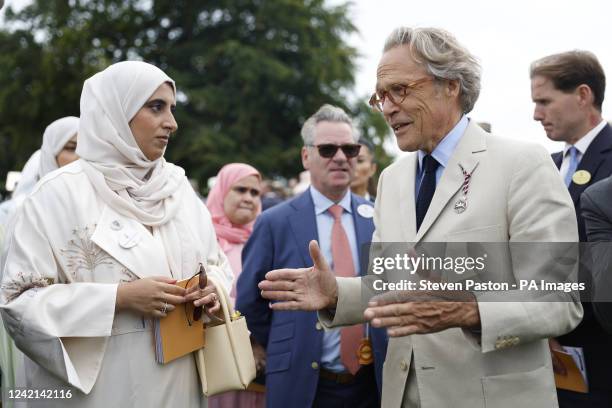 Sheikha Hissa Hamdan Al Maktoum speaks with the Duke of Richmond on day two of the Qatar Goodwood Festival 2022 at Goodwood Racecourse, Chichester....