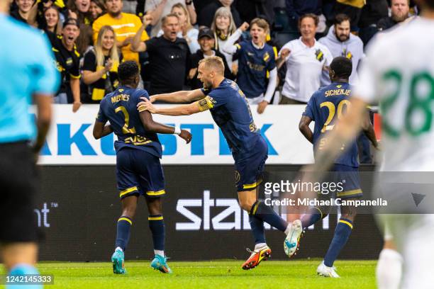 Josafat Mendes of AIK celebrates with teammate Sebastian Larsson after scoring the 1-0 goal during a UEFA Europa Conference League qualification...