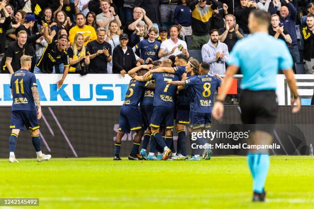 Josafat Mendes of AIK celebrates with teammates after scoring the 1-0 goal during a UEFA Europa Conference League qualification match between AIK and...