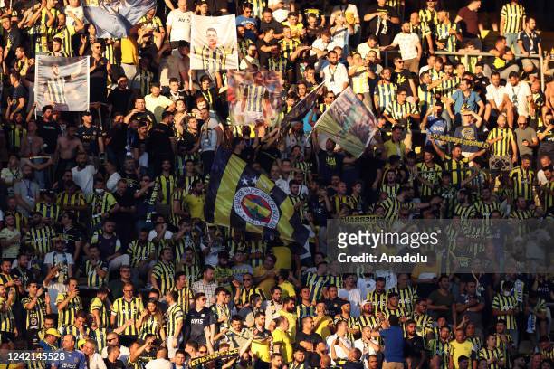 Supporters of Fenerbahce cheer during UEFA Champions League second qualifying round 2nd leg match between Fenerbahce and Dynamo Kyiv at Ulker Stadium...