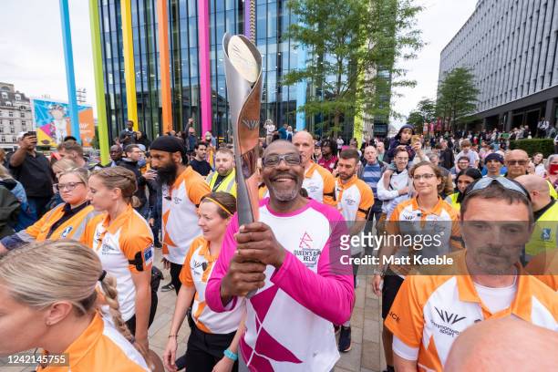 Sir Lenny Henry takes part in The Queen's Baton Relay as it visits Birmingham as part of the Birmingham 2022 Queen's Baton Relay on July 27, 2022 in...