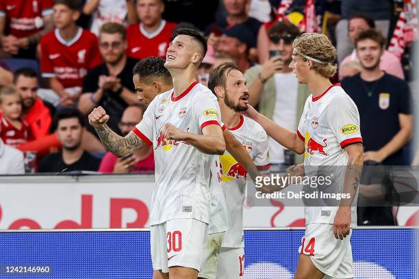 Benjamin Sesko of Red Bull Salzburg celebrates after scoring his team's first goal with teammates during the pre-season friendly match between FC Red...