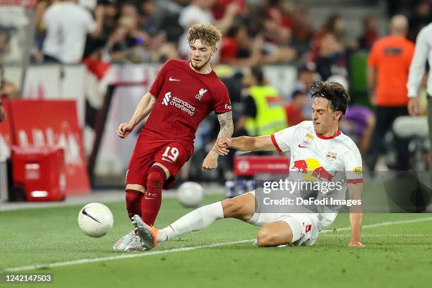 Harvey Elliott of Liverpool FC and Albert Vallci of Red Bull Salzburg battle for the ball during the pre-season friendly match between FC Red Bull...