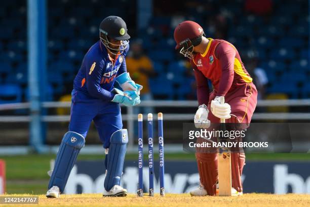 Brandon King , of West Indies, bowled by Axar Patel, of India, during the third and final ODI match between West Indies and India at Queens Park Oval...