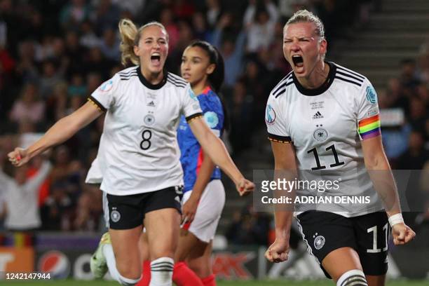 Germany's striker Alexandra Popp celebrates her second goal during the UEFA Women's Euro 2022 semi-final football match between Germany and France at...