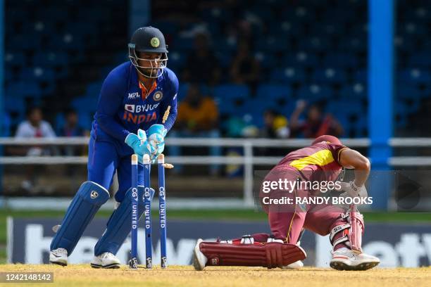 Shai Hope , of West Indies, is dismissed by Sanju Samson , of India, during the third and final ODI match between West Indies and India at Queens...