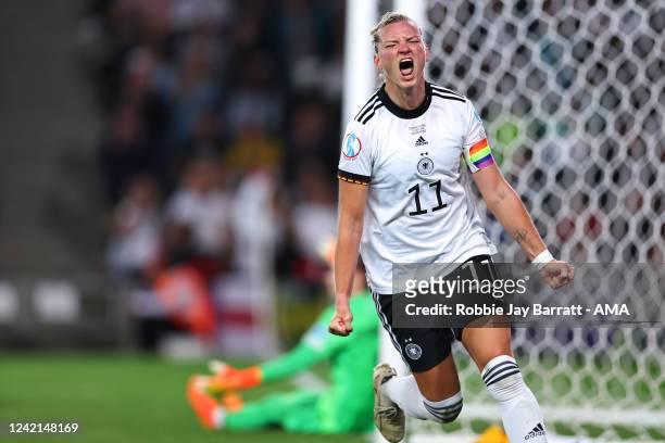 Alexandra Popp of Germany Women celebrates after scoring a goal to make it 2-1 during the UEFA Women's Euro England 2022 Semi Final match between...