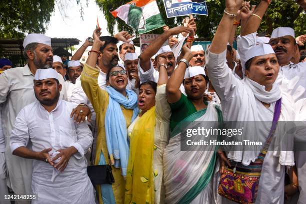 Members of Congress Sewa Dal raise slogans during a protest against EDs summon to Sonia Gandhi in connection to the National Herald Case, at AICC...