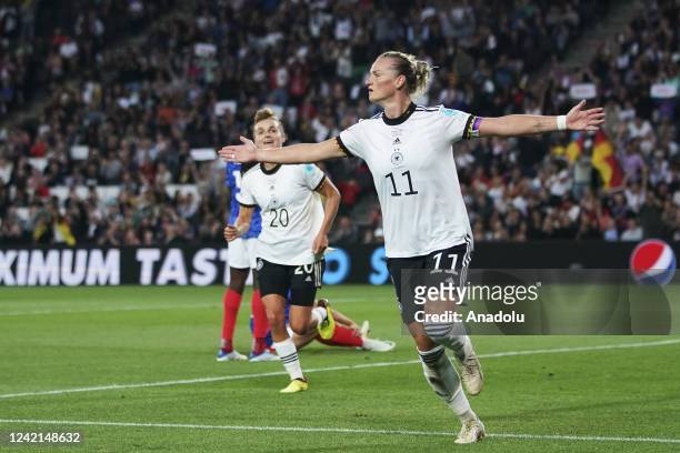 July: Alexandra Popp of Germany celebrates after scoring her sides first goal during the UEFA Women's Euro England 2022 Semi Final match between...