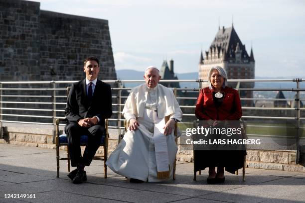 Canadian Prime Minister Justin Trudeau, Pope Francis, and Governor General of Canada Mary Simon sit for a photo at the Citadelle de Québec in Quebec...