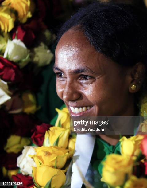 Ethiopian athletes are seen during a welcoming ceremony for athletes returning with 4 gold, 4 silver and 2 bronze medals at the 18th World Athletics...
