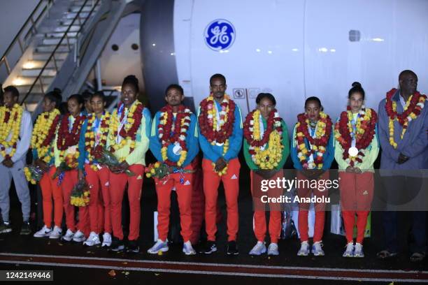 Ethiopian athletes are seen during a welcoming ceremony for athletes returning with 4 gold, 4 silver and 2 bronze medals at the 18th World Athletics...