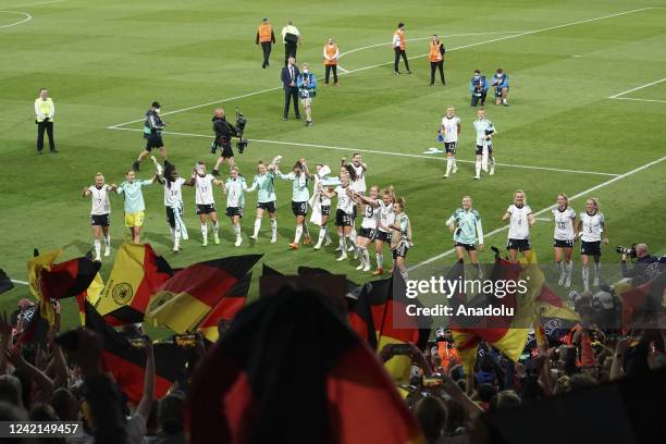 July: Germany players celebrate victory after the UEFA Women's Euro England 2022 Semi Final match between Germany and France at Stadium mk on July...