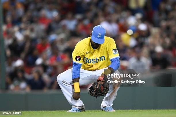 Franchy Cordero of the Boston Red Sox reacts after his third error of the night in the eighth inning against the Cleveland Guardians at Fenway Park...