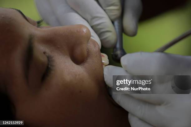 Woman from the Xochimilco district in Mexico City, during a dental consultation in the chinampera and lake area as part of the health project...