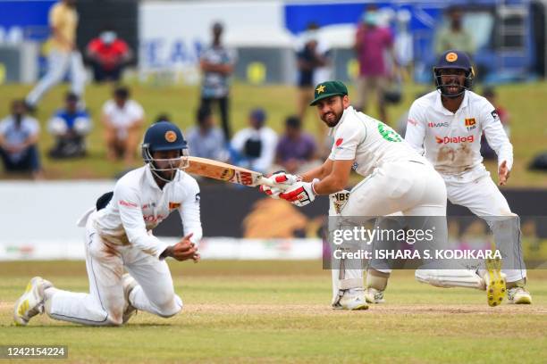 Sri Lanka's Kusal Mendis catches a ball to dismiss of Pakistan's Agha Salman during the final day of the second cricket Test match between Sri Lanka...