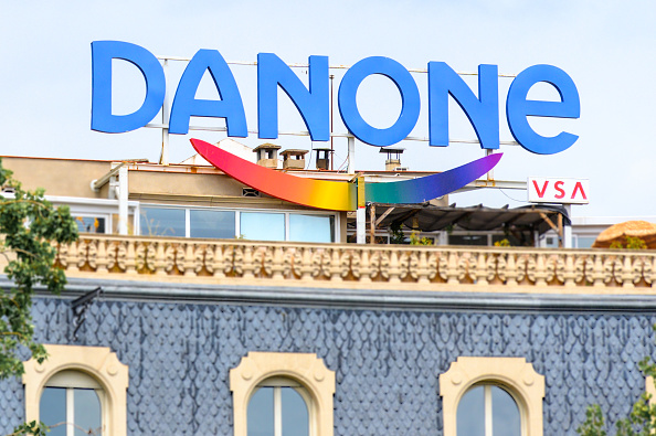 Danone logo or sign on top of an old building...