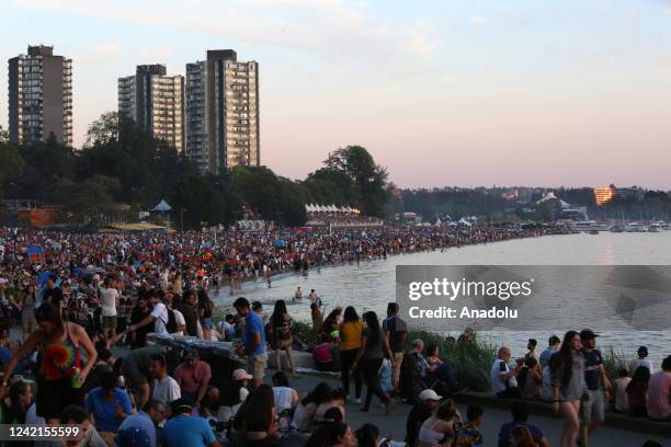 People gather at English Bay ahead of "Honda Celebration of Light" firework show in Vancouver, British Columbia on July 27, 2022.