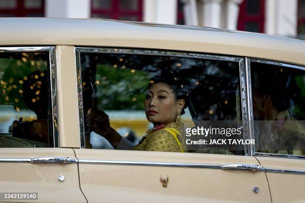 Thailand's Princess Sirivannavari looks out from the Royal motorcade as supporters gather in front of the Grand Palace during celebrations to mark...