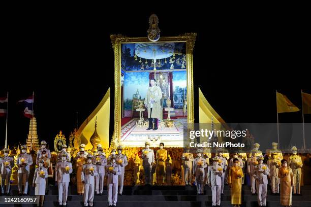 Thai Prime Minister Prayut Chan-o-cha leads as they gather at a candle light ceremony in the celebrations of the Thai King Maha Vajiralongkorn 70th...