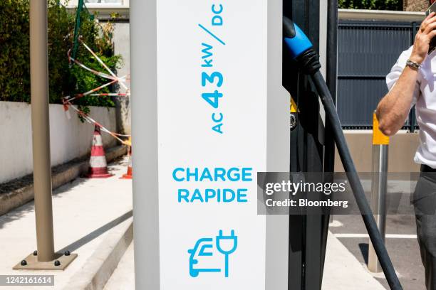 An electric vehicle charging station operated by TotalEnergies SE in the La Defense business district in Paris, France, on Thursday, July 28, 2021....