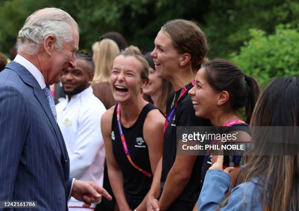 Britain's Prince Charles, Prince of Wales meets with members of the New Zealand hockey team during a visit to the Athletes Village at The University...
