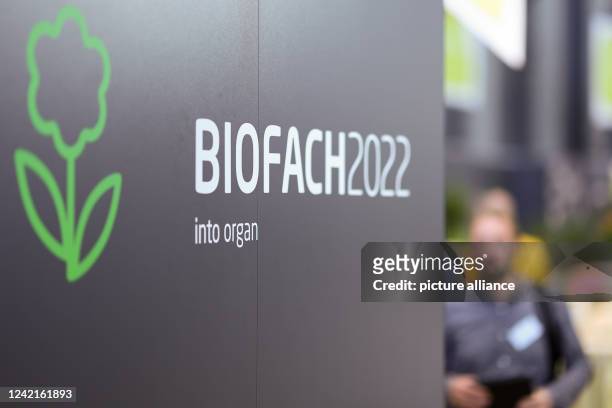 July 2022, Bavaria, Nuremberg: "Biofach 2022" is written on a wall at the Biofach trade fair. The world's leading trade fair for organic food and the...