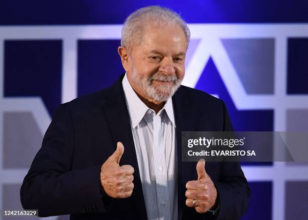 Brazilian presidential candidate for the leftist Workers Party and former President , Luiz Inacio Lula da Silva, gestures to supporters during the...