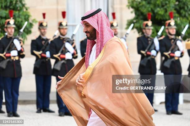 Saudi Crown Prince Mohammed bin Salman arrives at presidential Elysee Palace to meet France's President in Paris on July 28, 2022. French President...