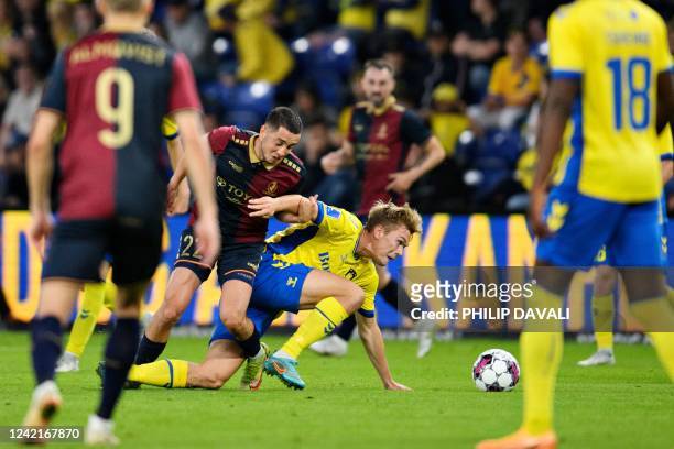 Pogon Szczecin's Vahan Bichakhchyan challenges Broendby's Danish midfielder Mathias Greve during the Europa Conference League qualifying football...
