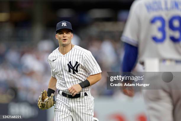 Andrew Benintendi of the New York Yankee runs to the dugout against the Kansas City Royals during the first inning at Yankee Stadium on July 28, 2022...