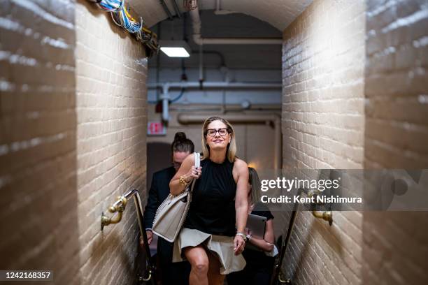 Sen. Kyrsten Sinema walks to a vote at the U.S. Capitol on Thursday, July 28, 2022 in Washington, DC. A day earlier, on Wednesday, Senate Majority...