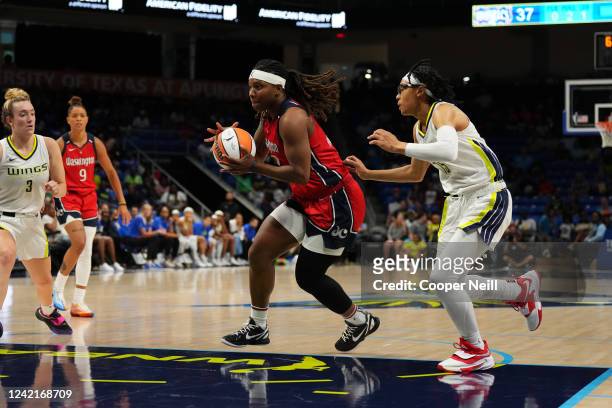 Myisha Hines-Allen of the Washington Mystics drives to the basket during the game against the Dallas Wings on July 28, 2022 at the College Park...