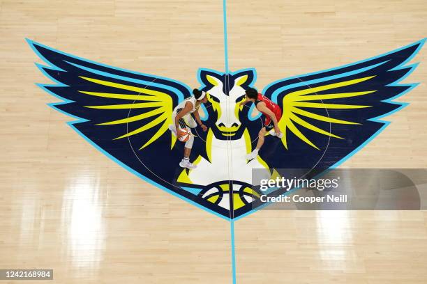 Tyasha Harris of the Dallas Wings dribbles the ball during the game against the Washington Mystics on July 28, 2022 at the College Park Center in...