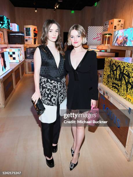 Kaitlyn Dever and Mady Dever at the Louis Vuitton 200 Trunks 200 Visionaries Exhibit Opening on July 28, 2022 in Los Angeles, California.
