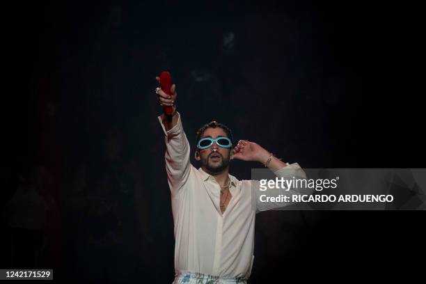 Puerto Rican rapper Bad Bunny performs on stage as part of his three-day "Un Verano Sin Ti" concert at the Coliseo de Puerto Rico in San Juan, Puerto...