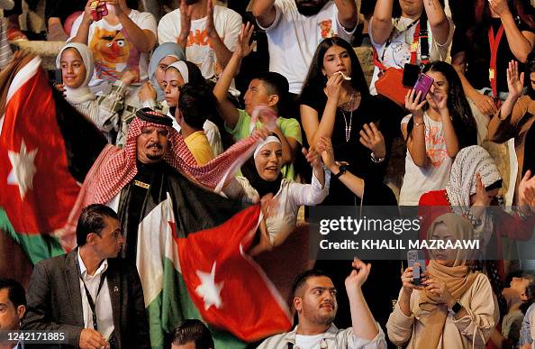 Assi Al Rack Fans cheer as Lebanese singer Assi al-Hallani performs at the Jerash ...