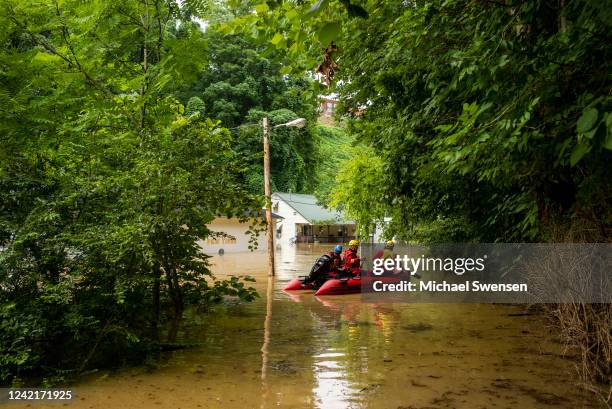 Members of the Morehead Fire Department conduct search and rescue operations downtown on July 28, 2022 in Jackson, Kentucky. Storms that dropped as...