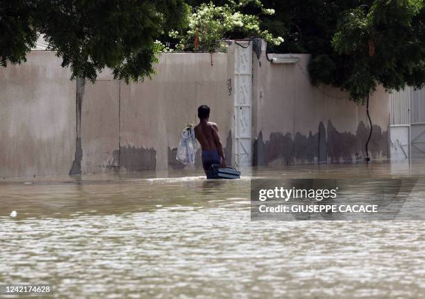 Flooded street is pictured in the UAE's Fujairah emirate following heavy rainfall on July 29, 2022.