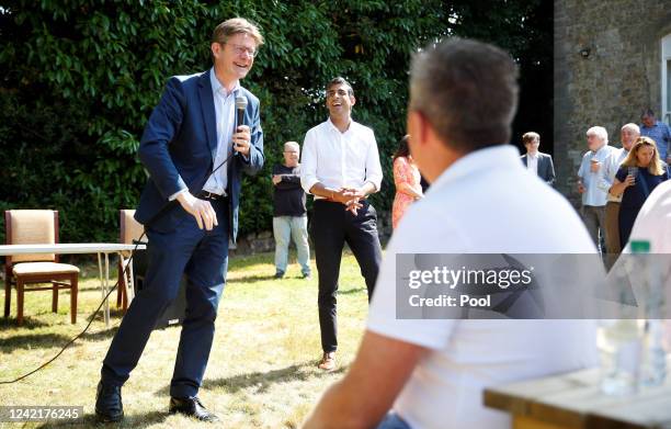 Secretary of State for Levelling Up Greg Clark introduces Conservative leadership candidate Rishi Sunak as he attends a Conservative Party leadership...